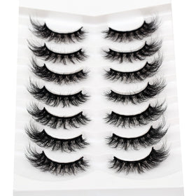 Pooplunch lashes beside ruler showing 16mm length for sizing clarity