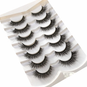 Pooplunch lashes beside ruler illustrating 15mm length for subtle lift