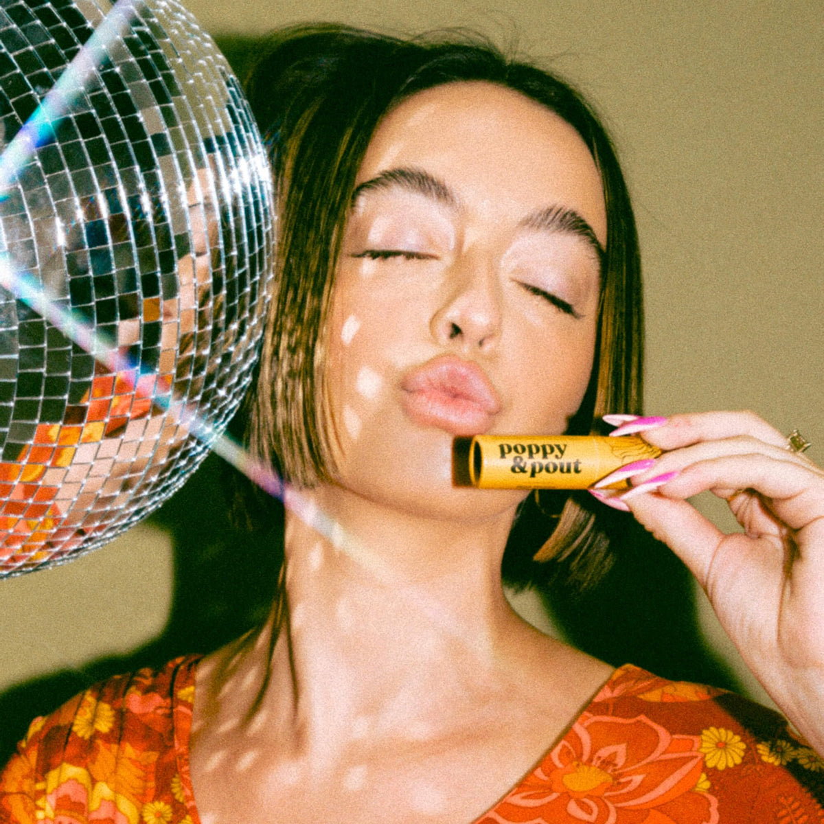 Poppy & Pout on nightstand lifestyle shot for bedside hydration routine