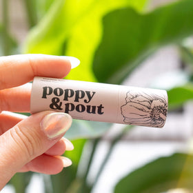 Poppy & Pout in hand for size comparison showing jumbo capacity convenience