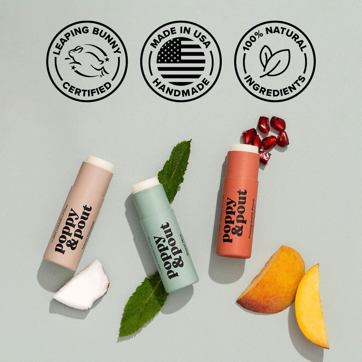 Poppy & Pout model applying balm showing subtle mint sheen and hydration