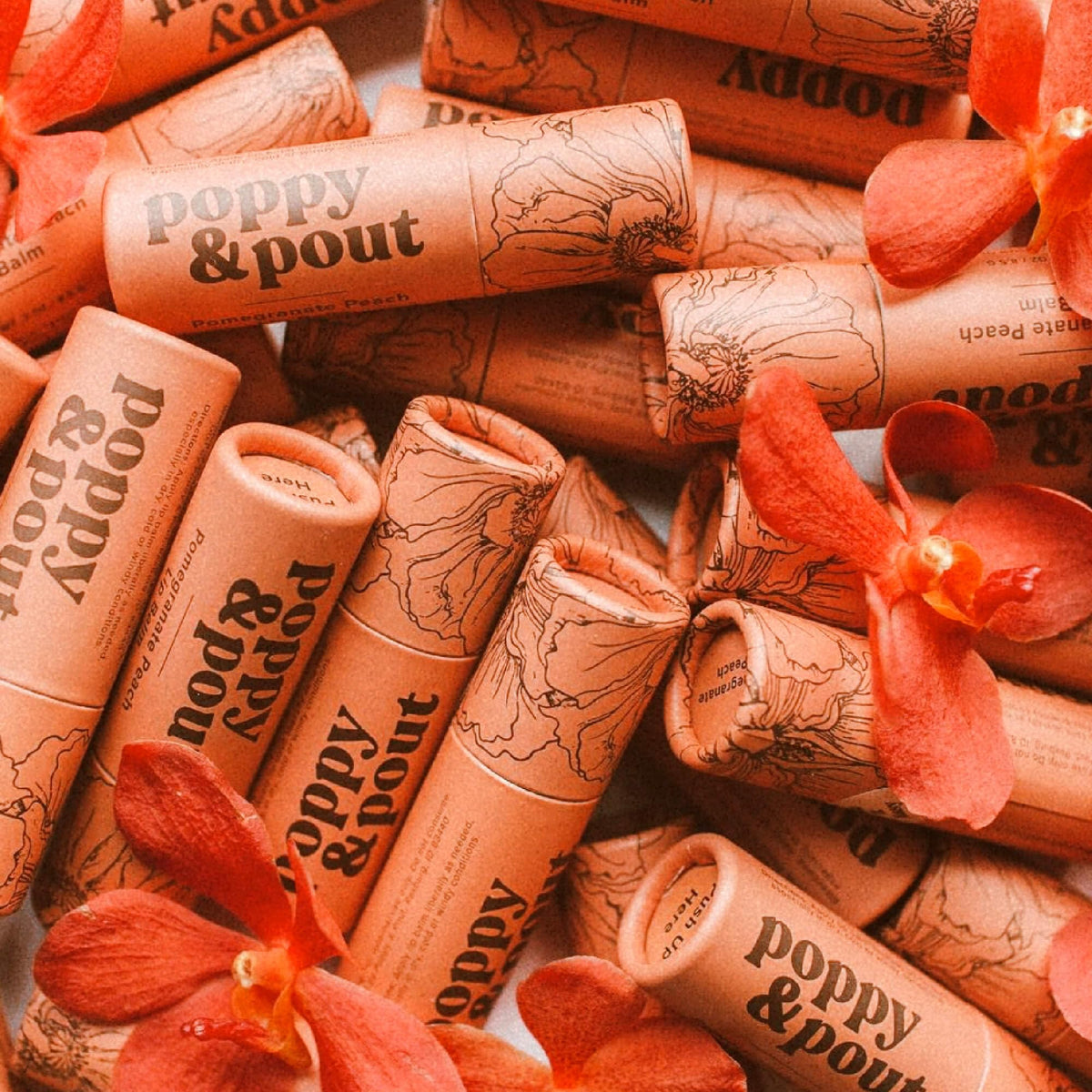 Poppy & Pout applied outdoors with sun backdrop for portable hydration benefit