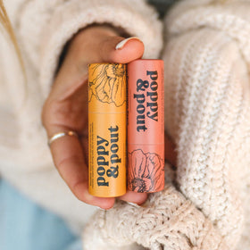 Poppy & Pout recyclable cardboard tube showcasing eco-friendly packaging benefit