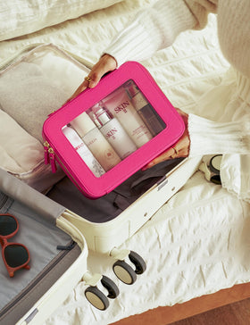 Popvibe bag beside a passport showing travel-ready size and fit