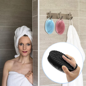 PQRUU scrubber held in hand to show size and ergonomic grip for controlled scrubbing