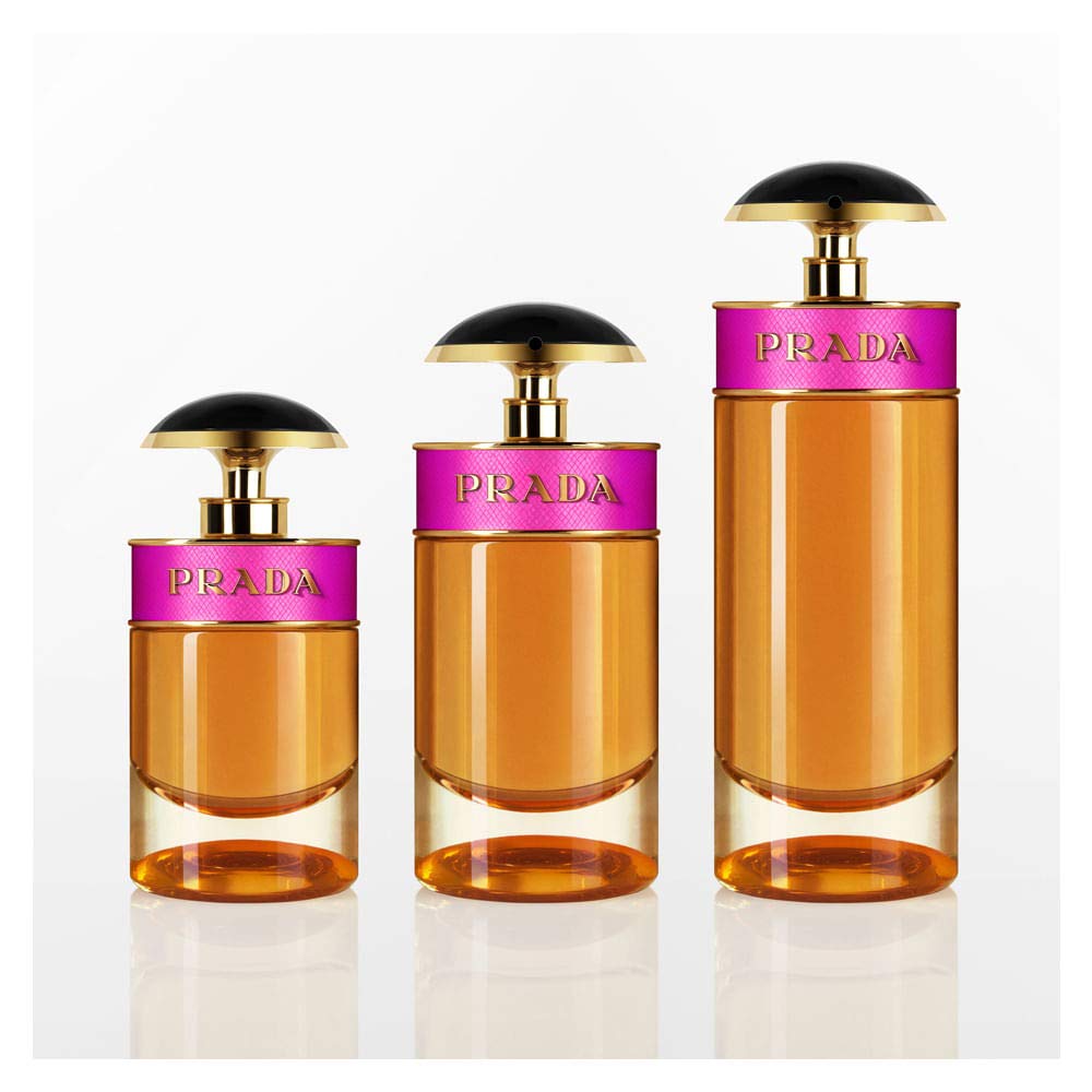 Prada Candy being sprayed on skin showcasing easy application and glow