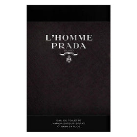 Prada L'Homme being sprayed on wrist demonstrating subtle daytime application