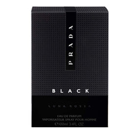 Prada Luna Rossa Black being sprayed on wrist demonstrating application and long-lasting aura
