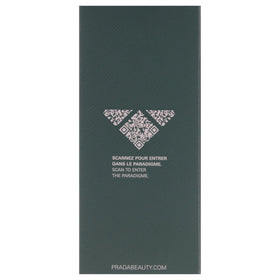 Prada Paradigme size comparison with hand showing travel-friendly 1.6 oz