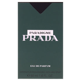 Prada Paradigme spray in use demonstrating fine mist and controlled application