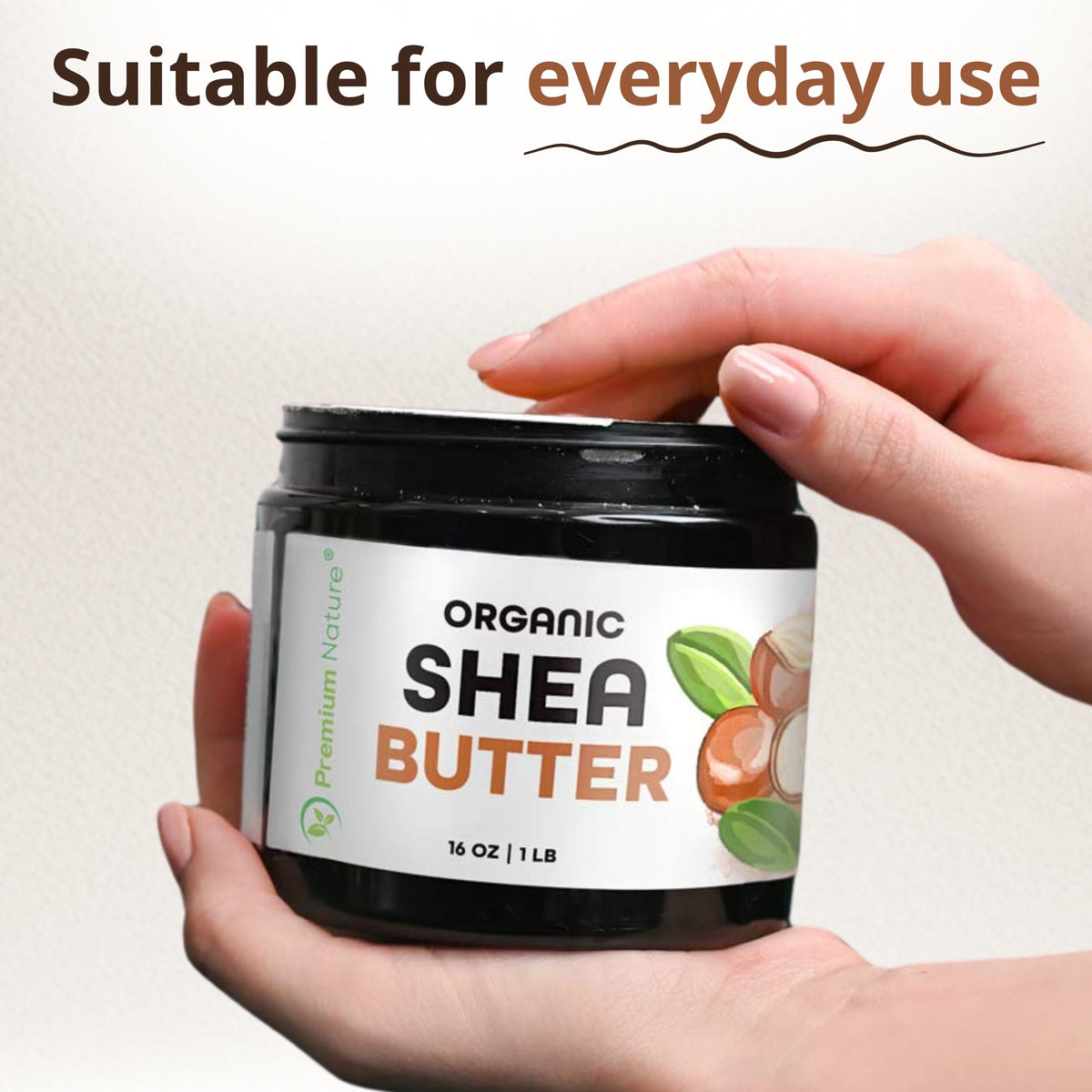 Premium Nature shea butter applied to hair ends to hydrate and reduce frizz