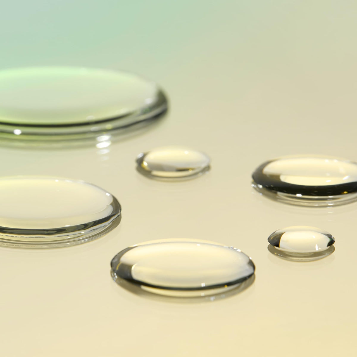 Prequel oil texture on fingertip showing lightweight spreadability
