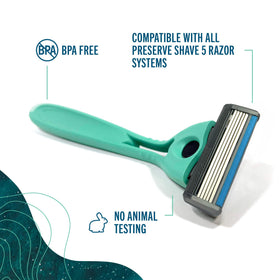 Hand holding Preserve POPi razor with lather illustrating comfortable shave control