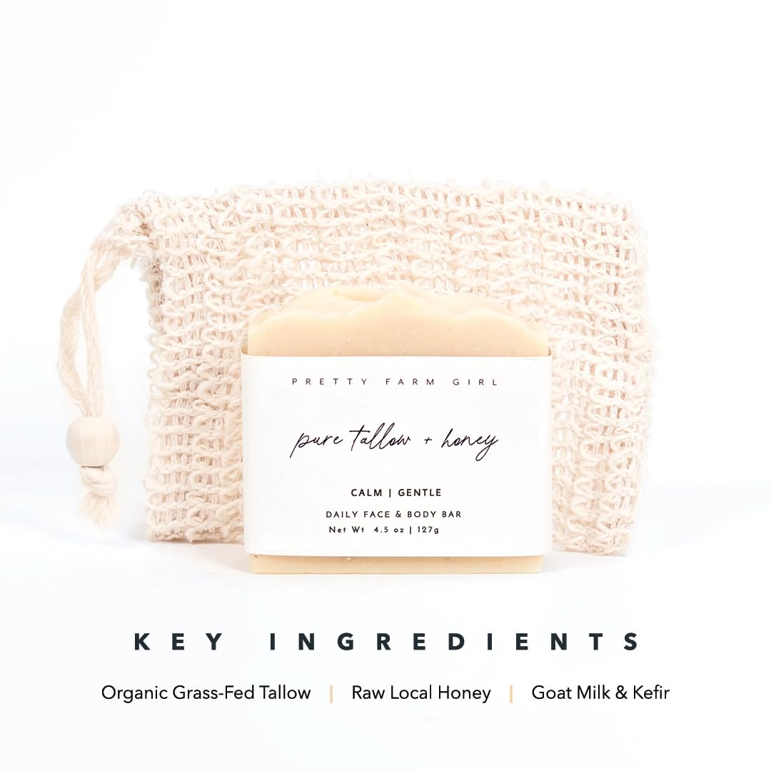 Pretty farm girl hand holding soap with lather demonstrating gentle cleanse