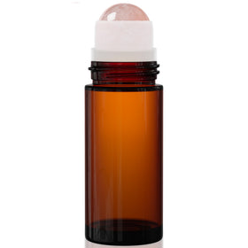 PrettyCare front packaging shot showing amber bottle and rose quartz roller for elegant application