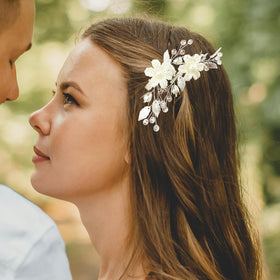 PRETTYLIFE close-up of ivory pearl flowers highlighting handcrafted detail and sparkle