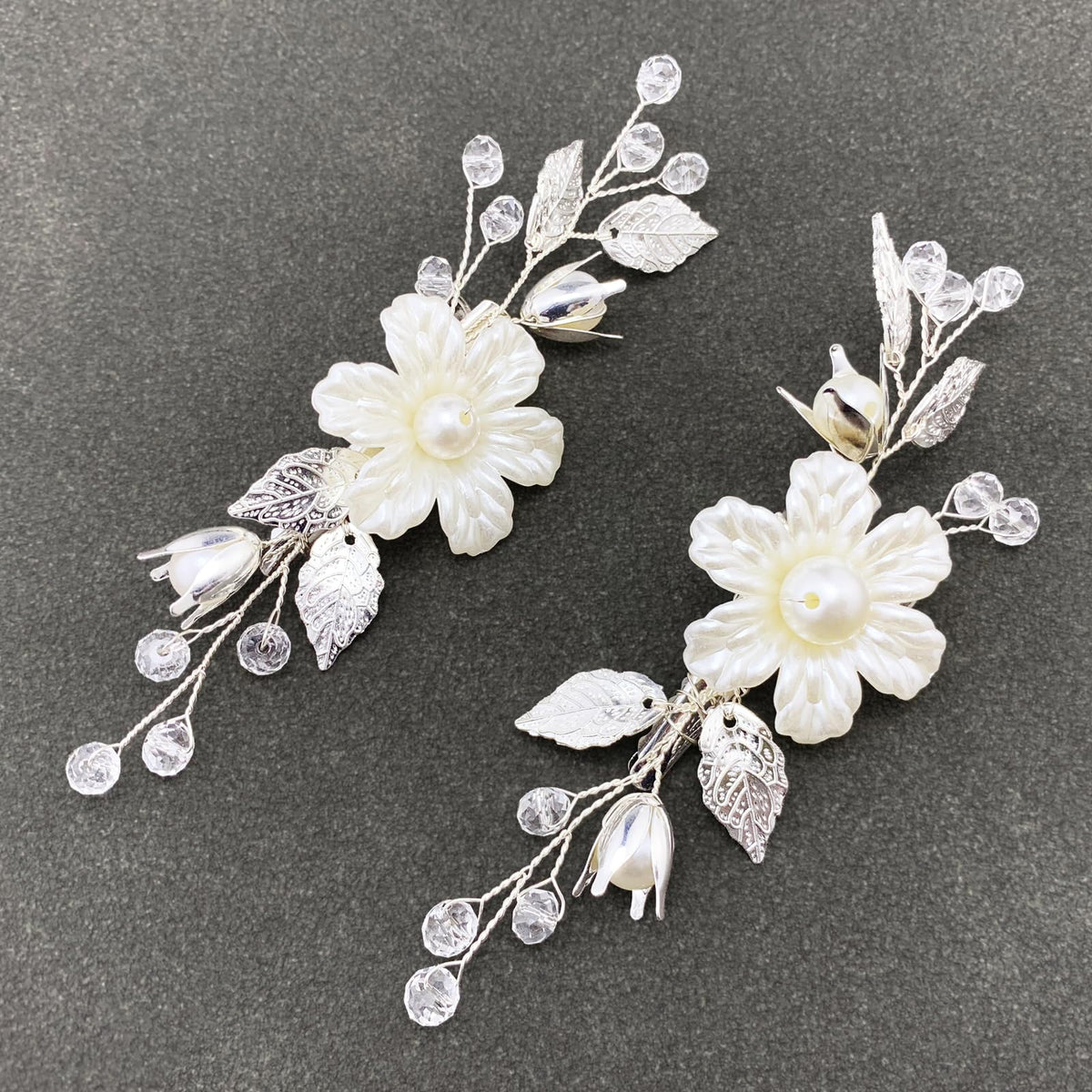 PRETTYLIFE front view packaging showing two ivory pearl flower clips enhancing bridal looks