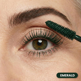 Prime Prometics brush detail combing through lashes for clump-free volume