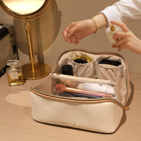 Prite lifestyle shot on suitcase showing travel-ready design and effortless packing benefit