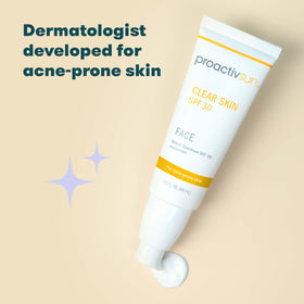 Proactiv applying to cheek demonstrating even coverage and no shine