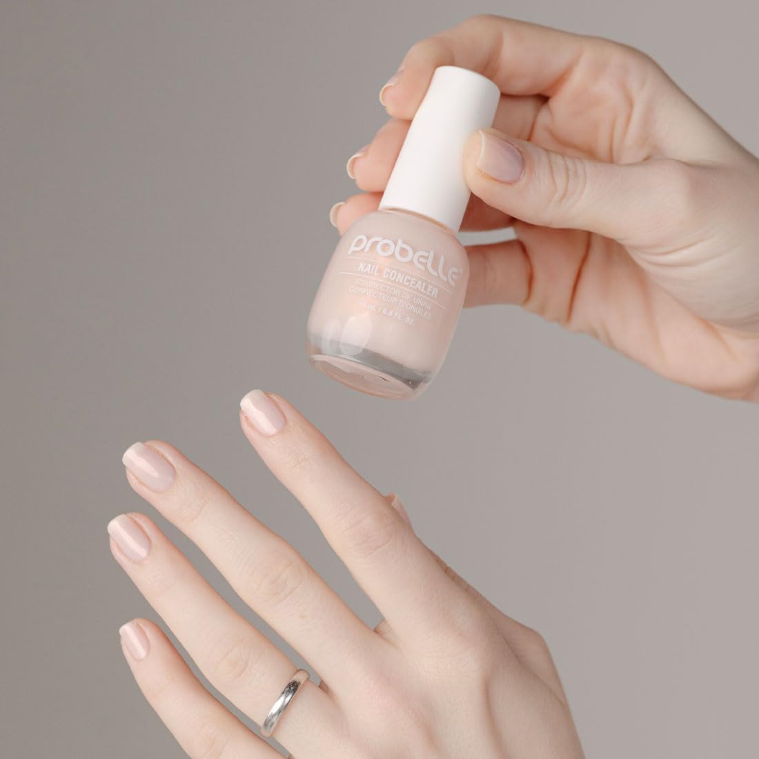 Manicured hands using Probelle polish for instant brighter-looking nails