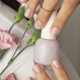 Probelle lilac swatch on stick illustrating sheer color payoff and correction