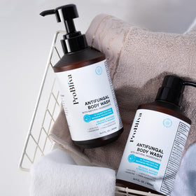 Hand holding ProBliva bottle to show size and portable benefit