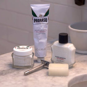 Proraso alum block applied to face demonstrating soothing post-shave benefit