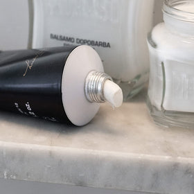 Proraso being applied with a shaving brush showing smooth glide benefit