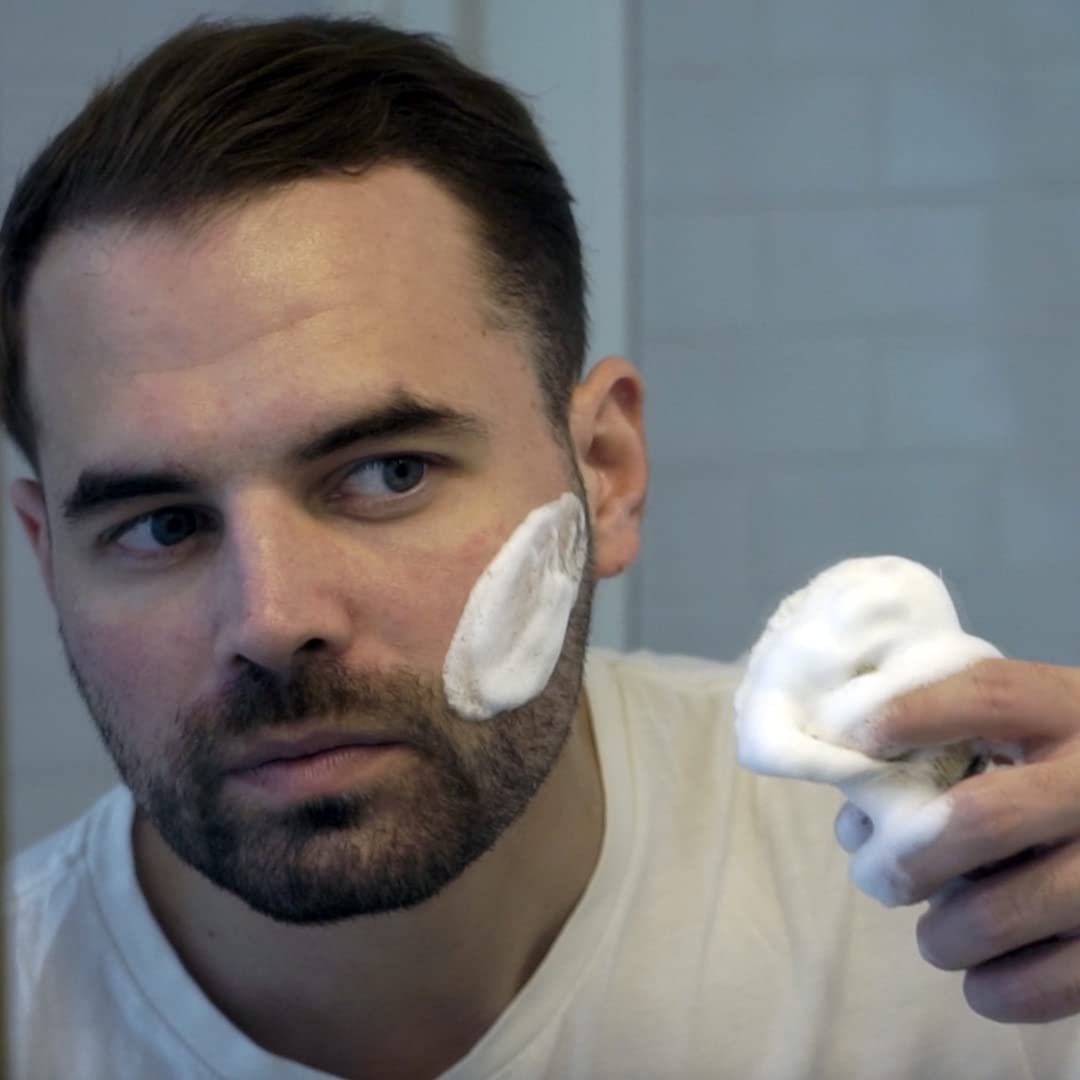 Proraso dense lather close-up on skin, demonstrating cushion and protection