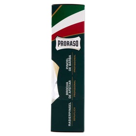 Proraso brush in use creating rich lather on face for smoother razor glide