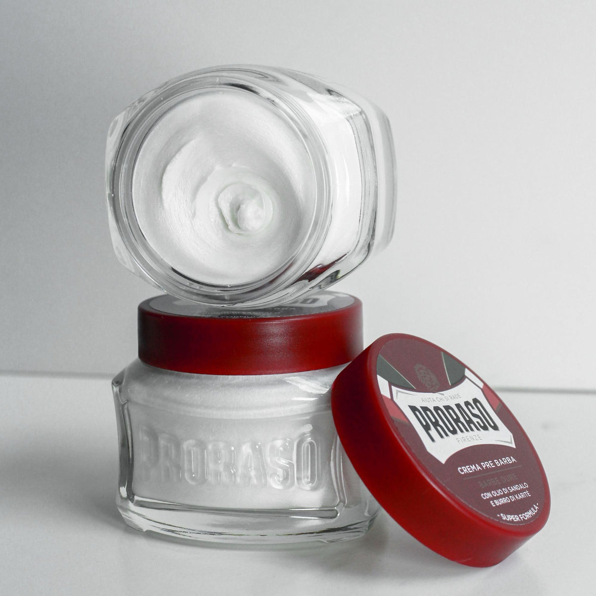 Proraso being applied to damp beard demonstrating smoother razor glide