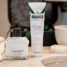 Proraso shaving cream in bathroom setup illustrating a calming grooming ritual