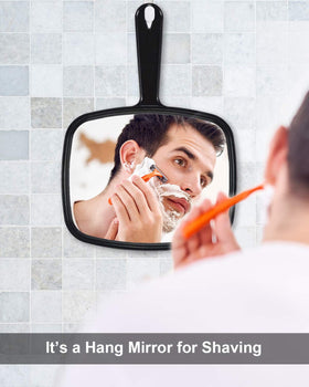 PROTECLE mirror held in hand to show size and easy maneuvering benefit for stylists