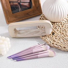 Psyqtsuary pouch holding makeup brushes for quick-access organization