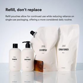 Public Goods conditioner in shower with hair for hydrated-looking hair benefit