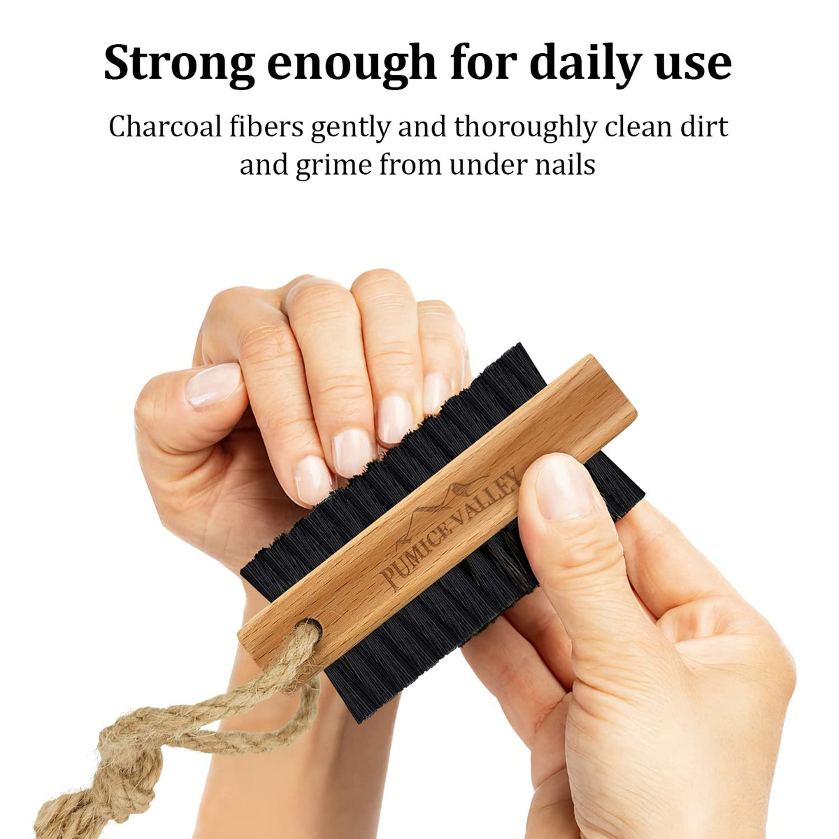 Pumice Valley brush in use cleaning fingernails to remove dirt efficiently