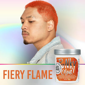 Punky color applied to mid-lengths and ends showcasing vivid orange payoff