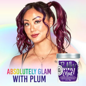 Punky applied on hair strand close-up showing vivid plum pigment payoff
