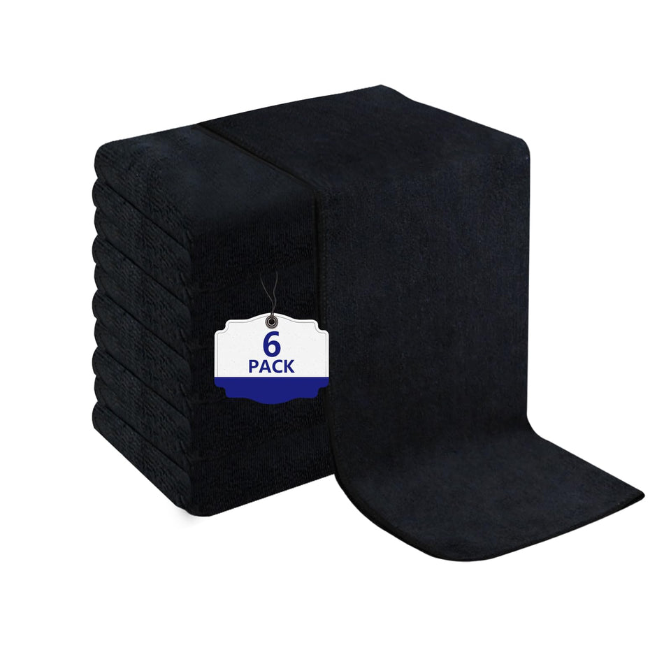 Puomue front view of six black salon towels showing clean professional look and durability