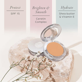 PÜR MINERALS compact with brush applying powder for quick touch-up and natural finish