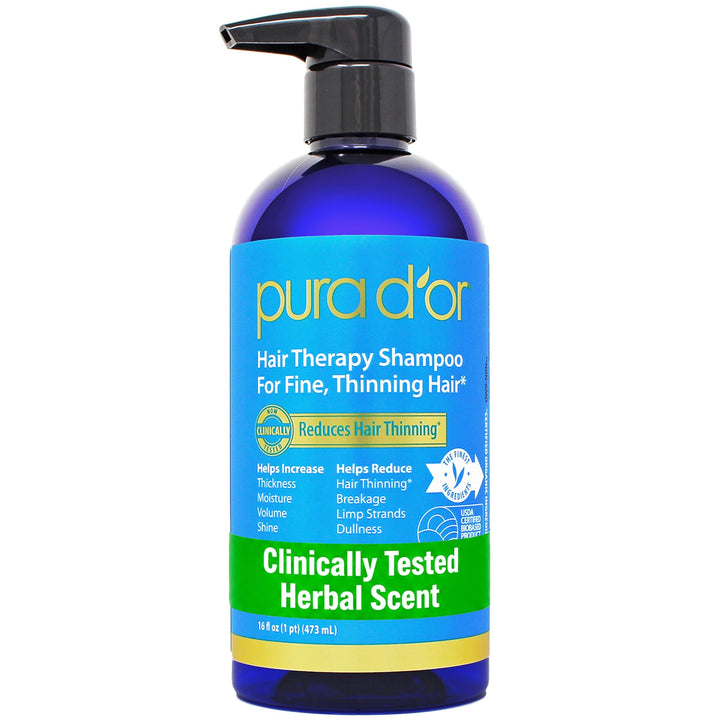 PURA D'OR front packaging showing blue label and 16 fl oz bottle, promotes thicker hair