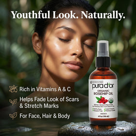 PURA D'OR applying oil to face demonstrating hydration and glow benefit