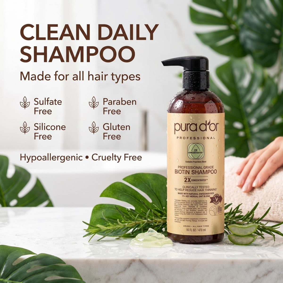 PURA D'OR shampoo in hand being applied to hair for improved manageability
