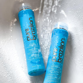 Pure Brazilian duo on bathroom shelf styled to show salon-quality benefit
