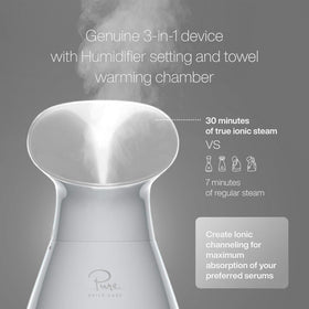 Pure Daily Care NanoSteamer towel warming chamber open with warm towel ready for refreshing use