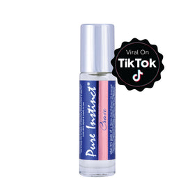 Pure Instinct roll-on applicator close-up displaying smooth metal ball for precise application