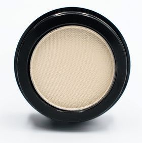 Pure Ziva compact held beside a coin showing size and travel-friendly benefit