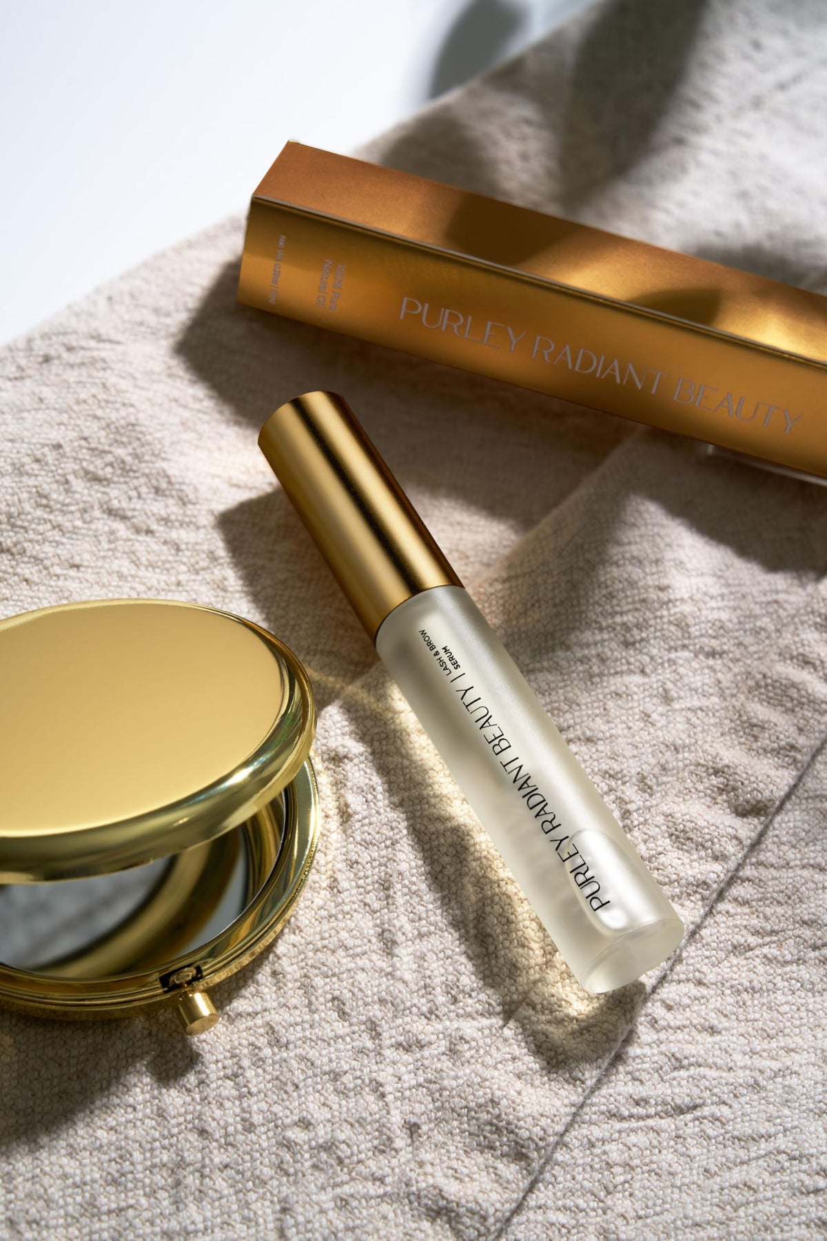 Purely Radiant serum applied along lashline showing easy, non-greasy nightly use