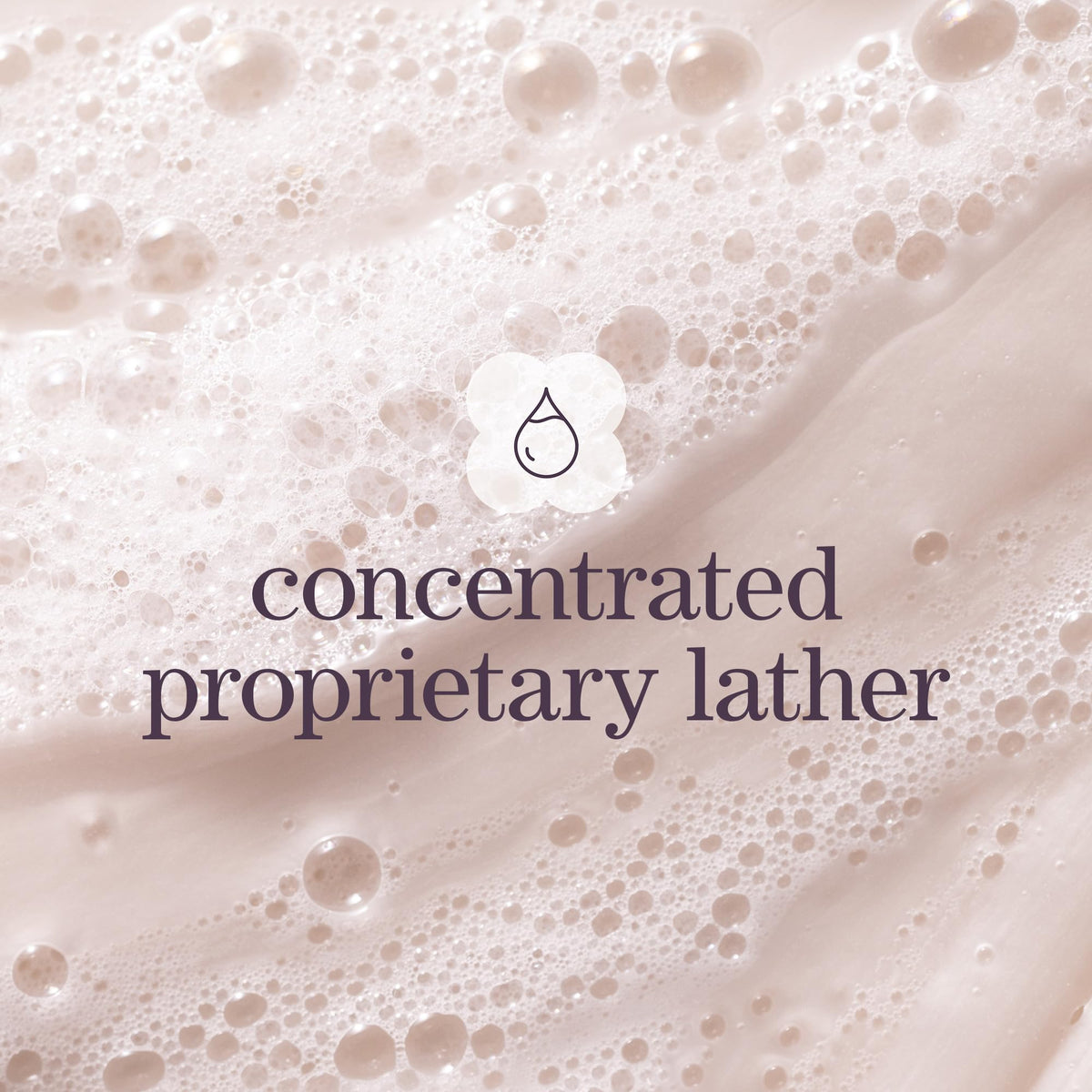 Person using Pureology Hydrate Sheer in shower for hydrated, weightless hair